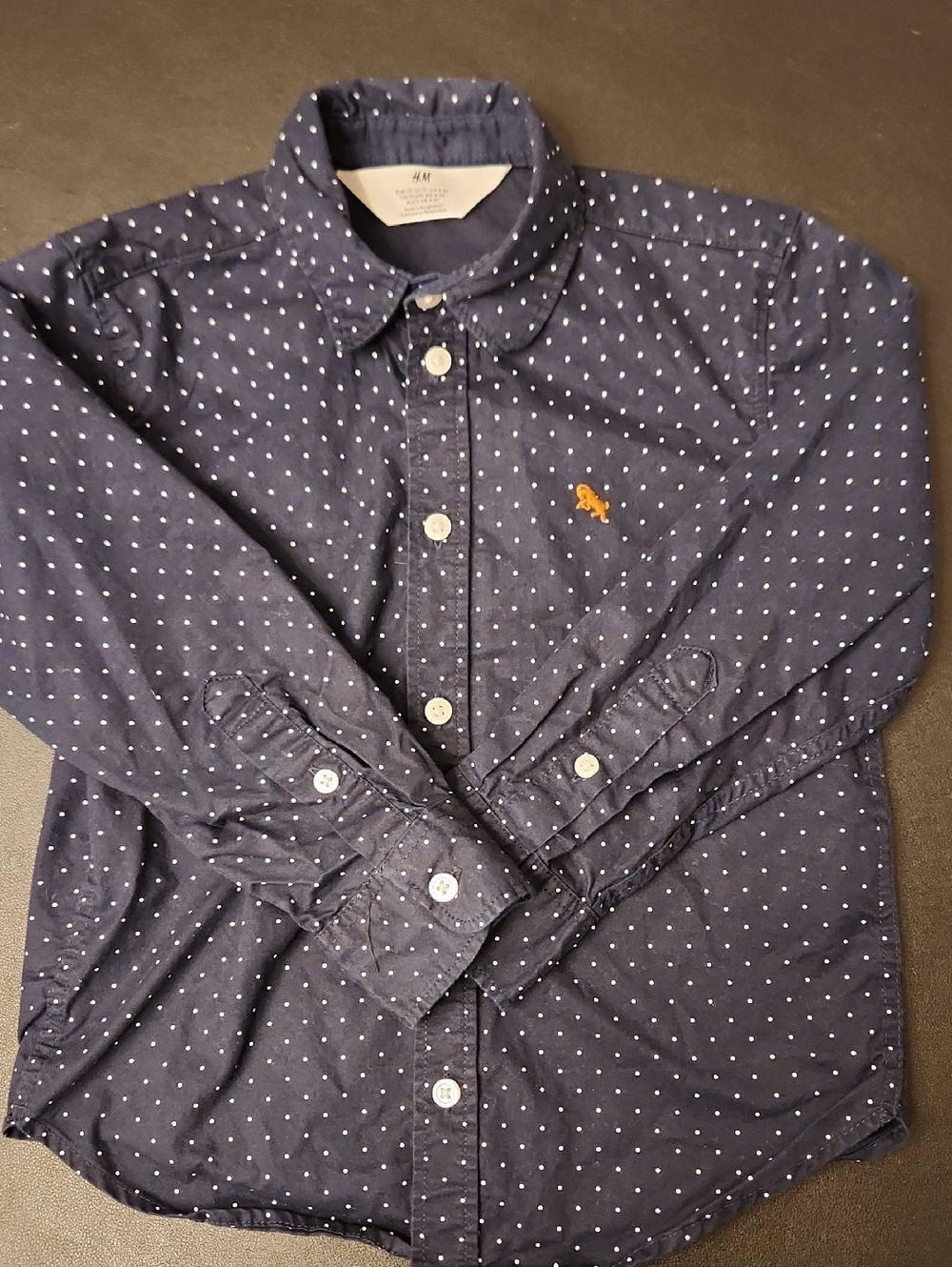 H&M Navy Shirt with White Polka Dots and Brown Embroidered Logo. Size 4/5
